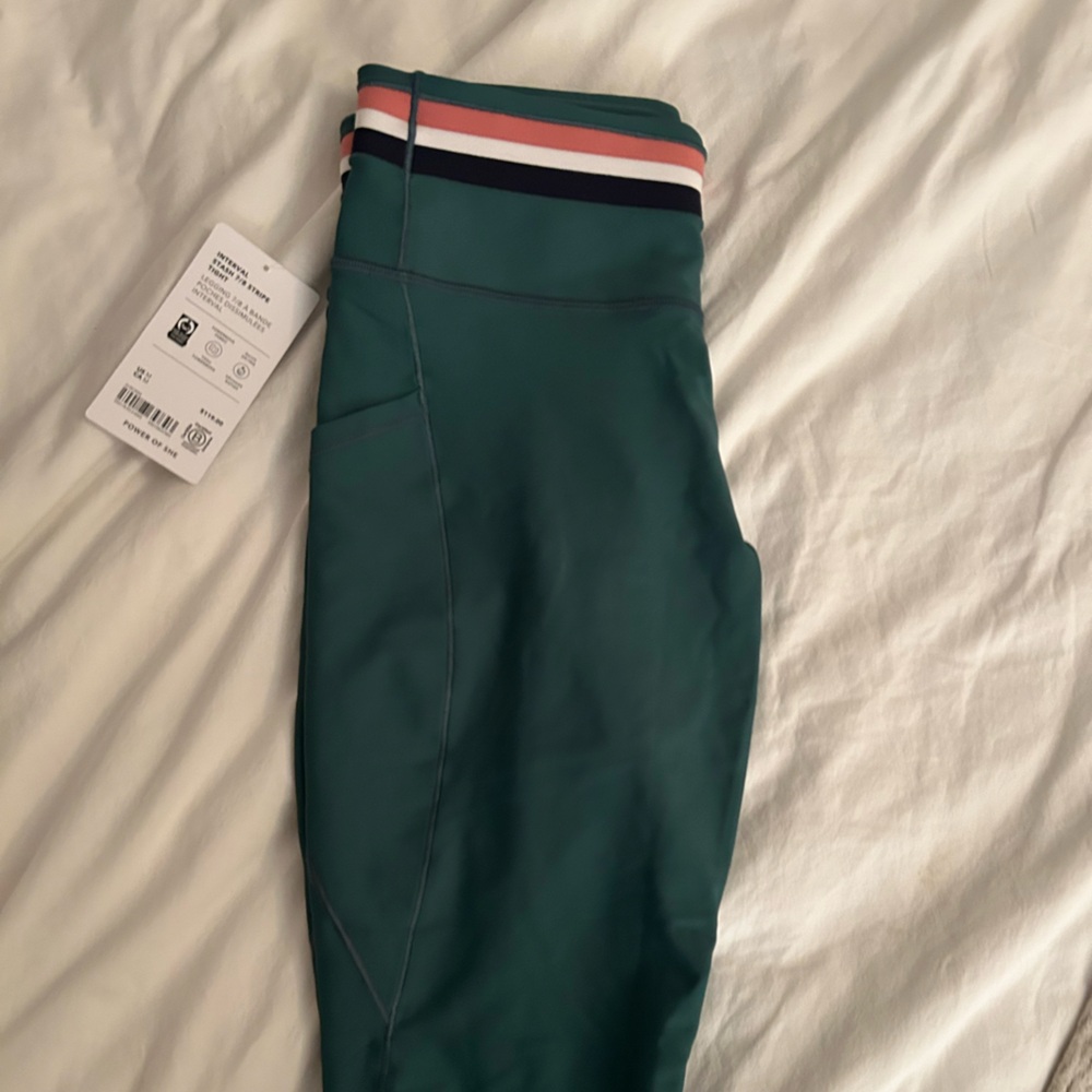 Athleta Interval Stash High Rise Stripe 7/8 Leggings